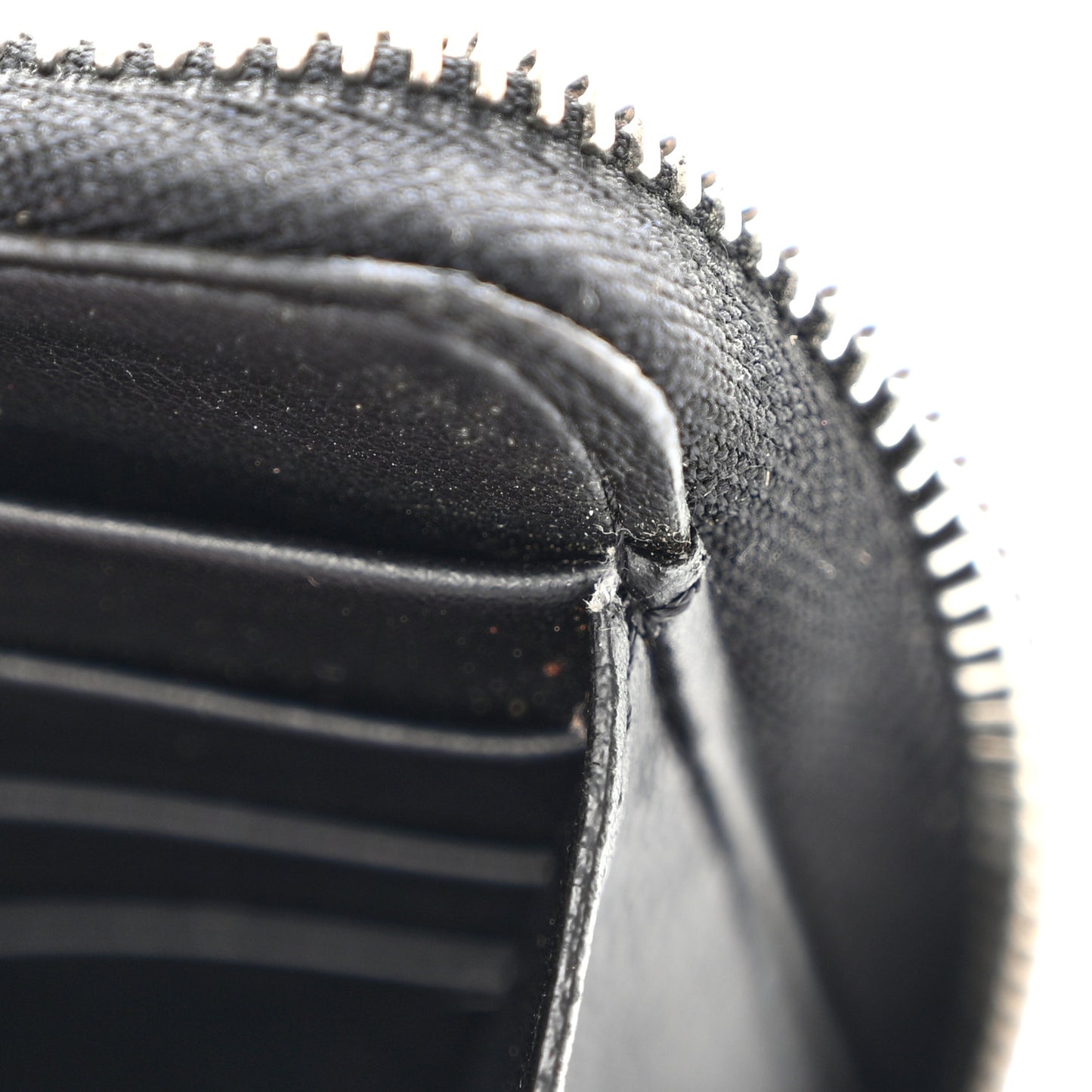 Calfskin Logo Star Embossed Zip Around Wallet Black