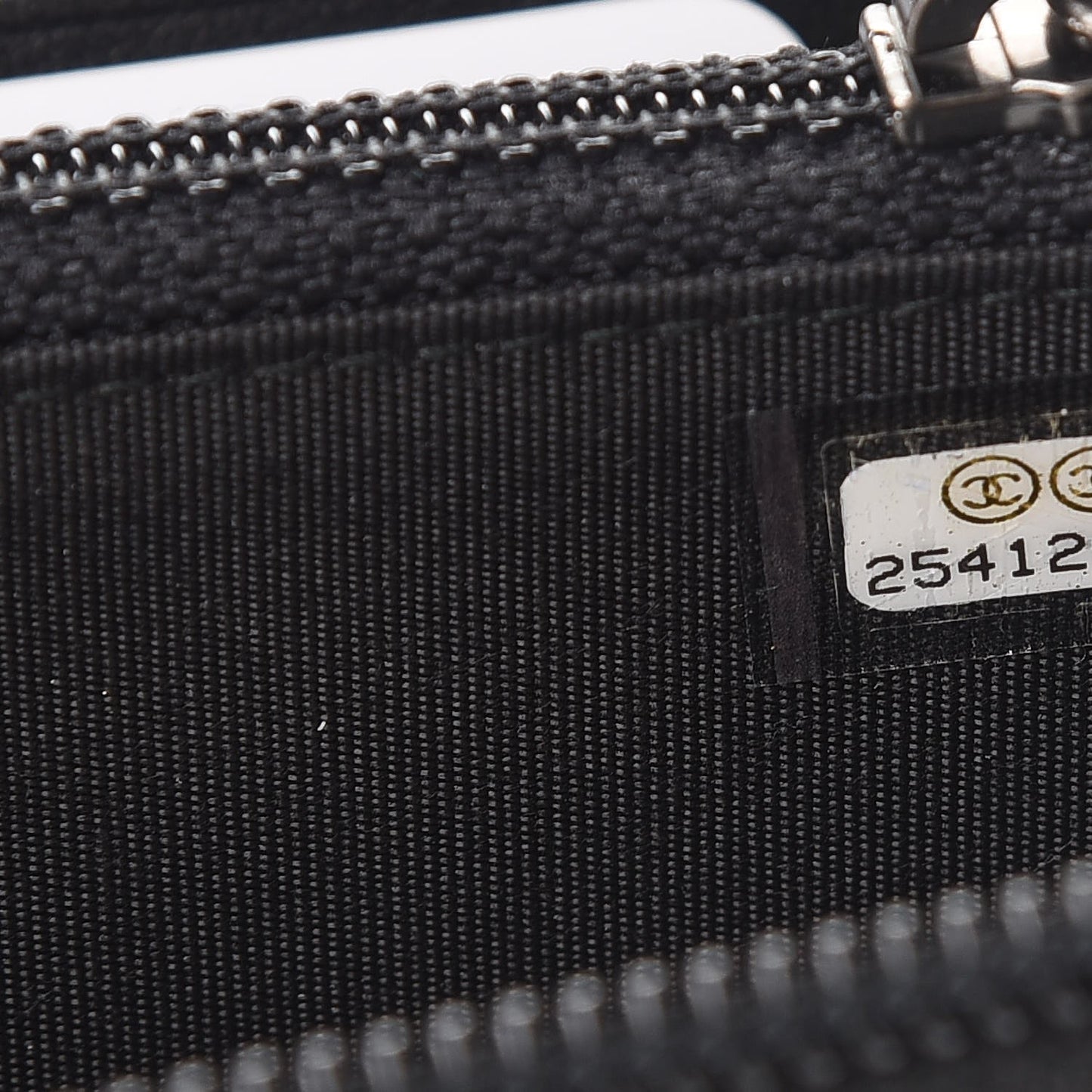 Caviar Quilted Small Boy Zip Around Wallet Black