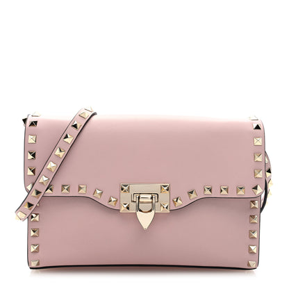 Valentino Garavani Vitello Medium Rockstud Flip Lock Crossbody Bag Rose Quartz 1 of 9