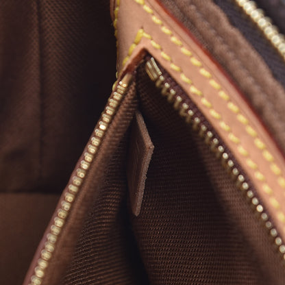 Louis Vuitton Monogram Trotteur 7 of 13