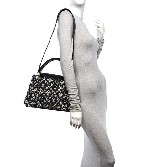 Calfskin Since 1854 Embroidered Capucines PM Black