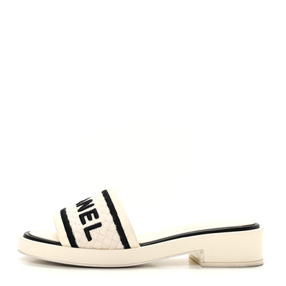 Chanel Lambskin Embroidered Logo Mules 39 Ivory Black 1 of 8