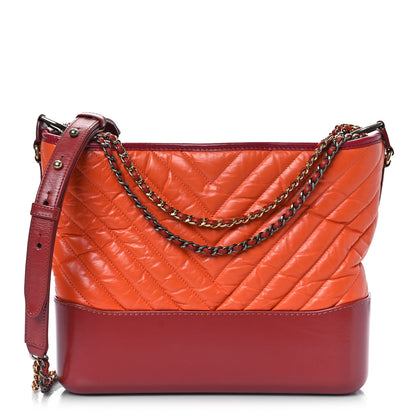 Chanel Aged Calfskin Chevron Quilted Medium Gabrielle Hobo Dark Red Orange 1 of 9