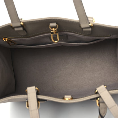 Louis Vuitton Empreinte Monogram Giant Onthego MM Tourterelle 5 of 10