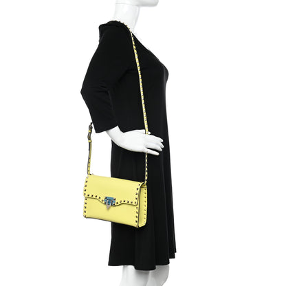 Valentino Garavani Pebbled Calfskin Rockstud Flip Lock Crossbody Bag Yellow 2 of 8