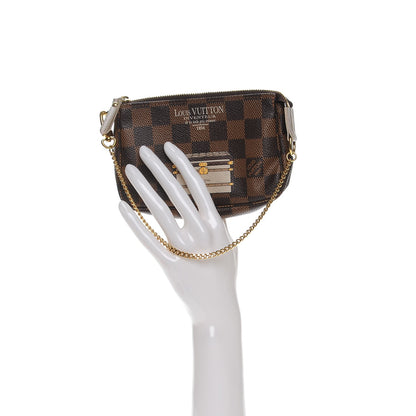 Louis Vuitton Damier Ebene Trunks and Locks Mini Pochette Accessories 2 of 7