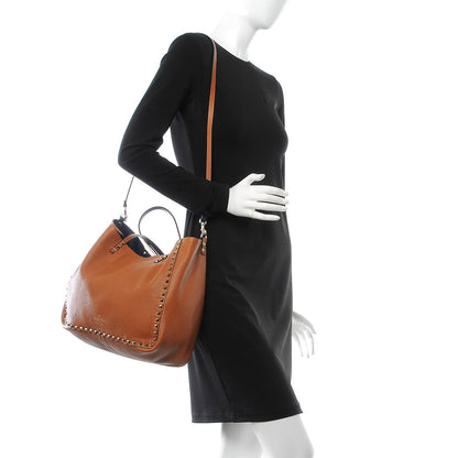 Valentino Garavani Pebbled Calfskin Medium Rockstud Reversible Tote Light Cuir Marine 5 of 12
