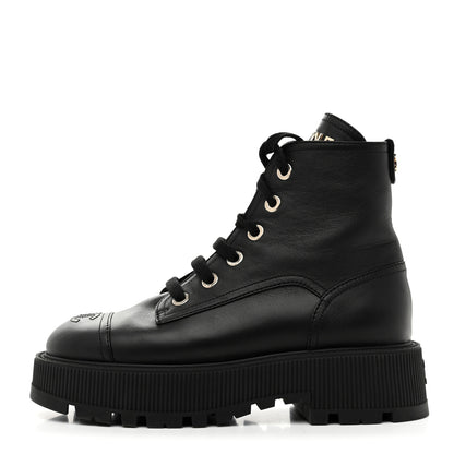 Chanel Grained Calfskin Shiny Calfskin CC Lace Up Combat Boots 37.5 Black 1 of 9