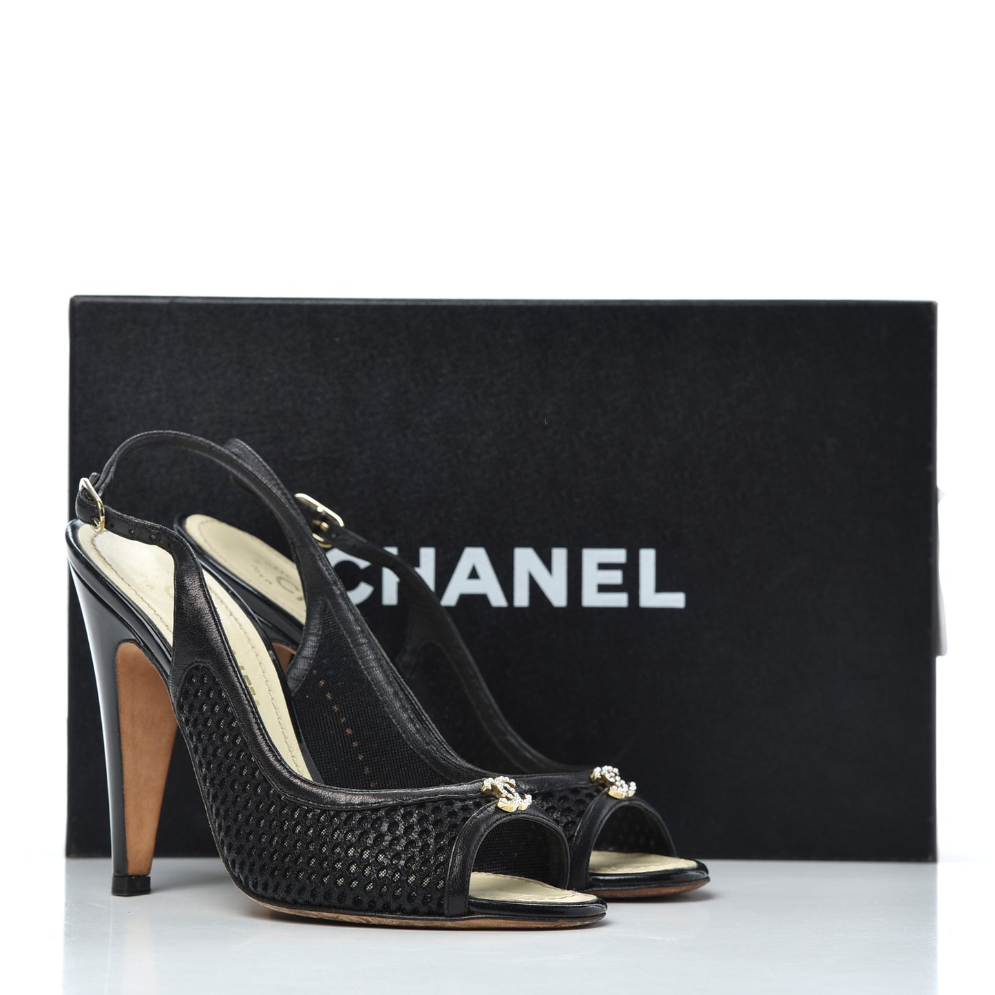 Lambskin Perforated CC Slingback Pumps 36 Black
