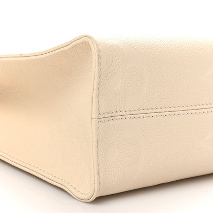 Louis Vuitton Empreinte Monogram Giant Onthego PM Cream Beige 8 of 10