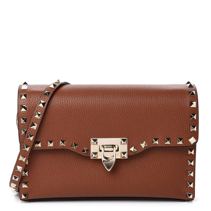 Valentino Garavani Pebbled Calfskin Medium Rockstud Flip Lock Crossbody Bag Brown 1 of 9