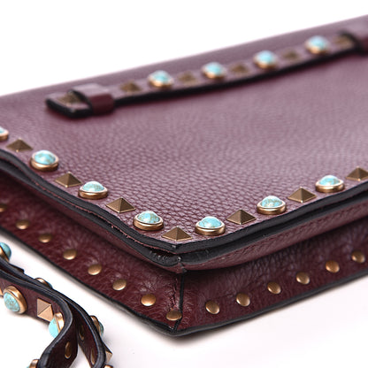 Valentino Garavani Pebbled Calfskin Rockstud Rolling Wristlet Clutch Rubin 6 of 11