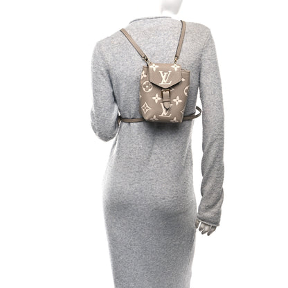 Louis Vuitton Empreinte Monogram Giant Tiny Backpack Tourterelle Cream 2 of 9