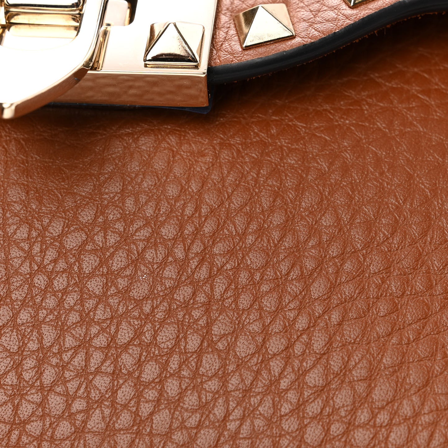 Pebbled Calfskin Medium Rockstud Flip Lock Crossbody Bag Bright Cognac