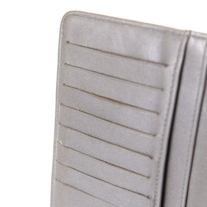 Chanel Lambskin Camellia Embossed Yen Wallet Black 8 of 12