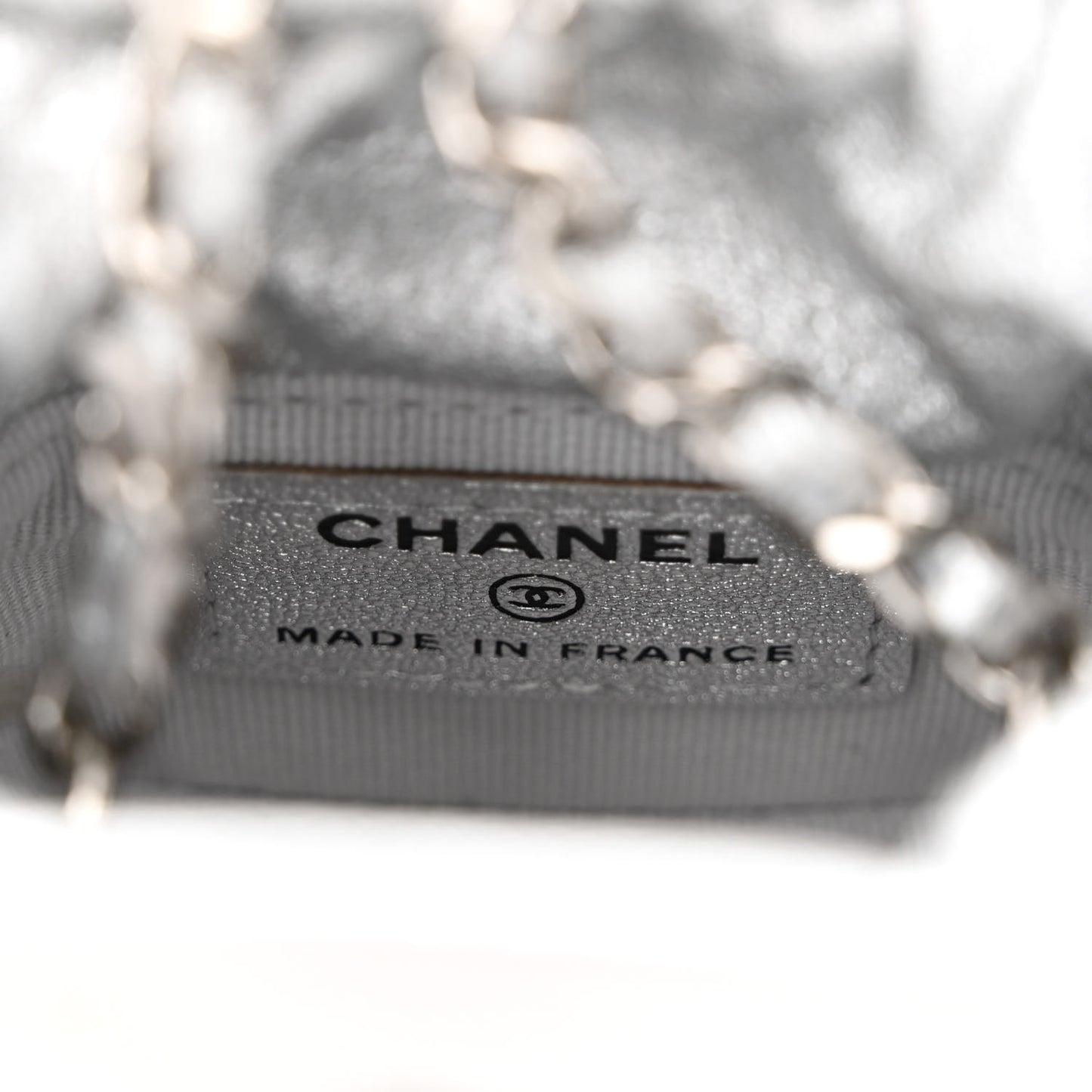 Metallic Caviar Quilted Mini Drawstring Bucket Bag Silver