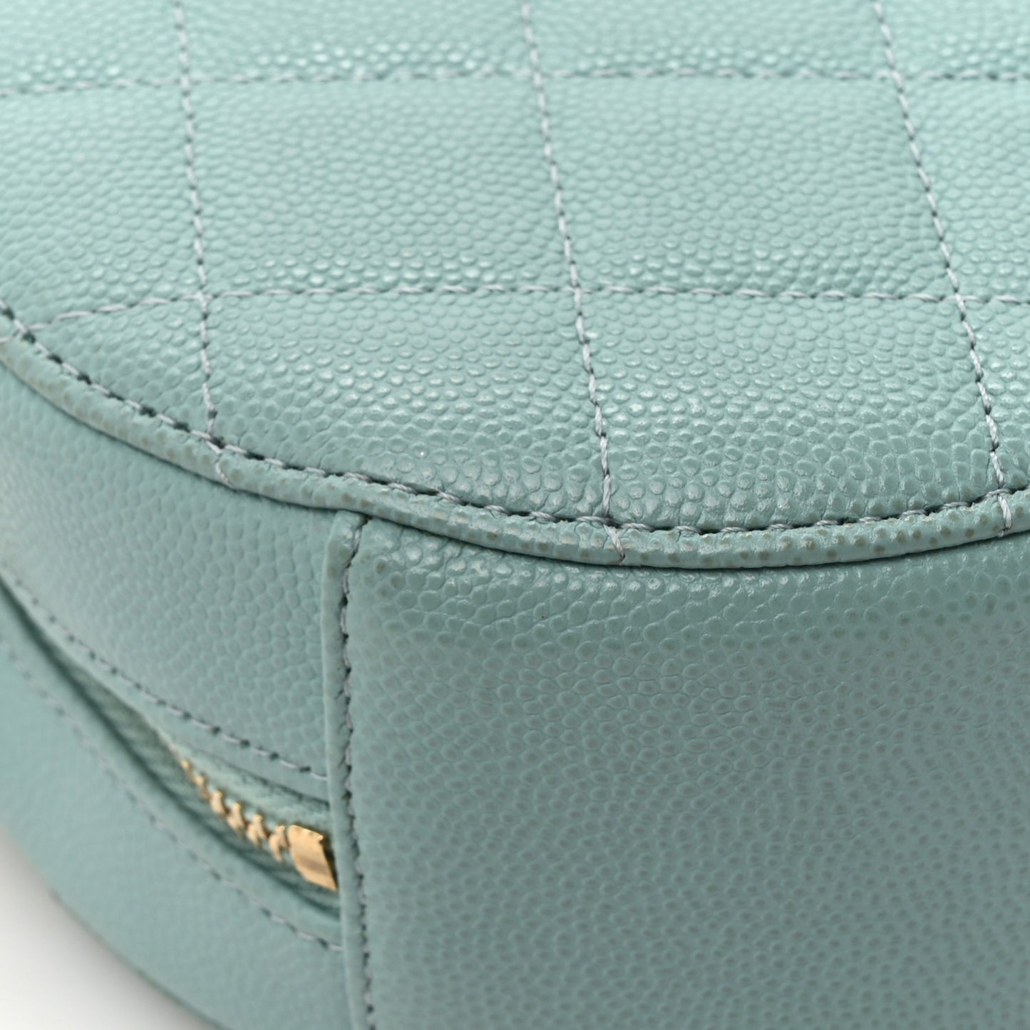 Caviar Quilted Round Clutch With Chain Light Blue
