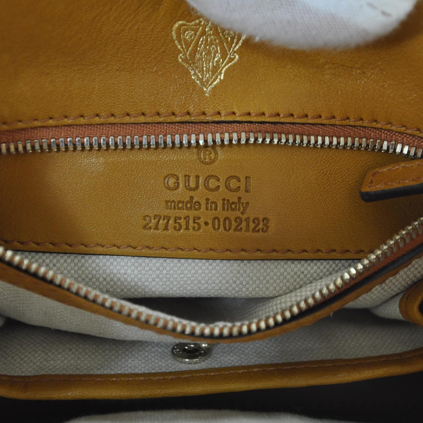 Leather Small Stirrup Top Handle Bag