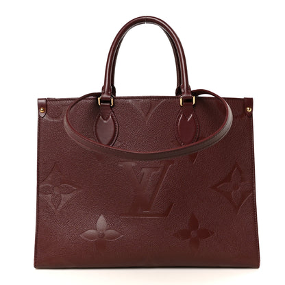 Louis Vuitton Empreinte Monogram Giant Onthego MM Wine Wine 1 of 9