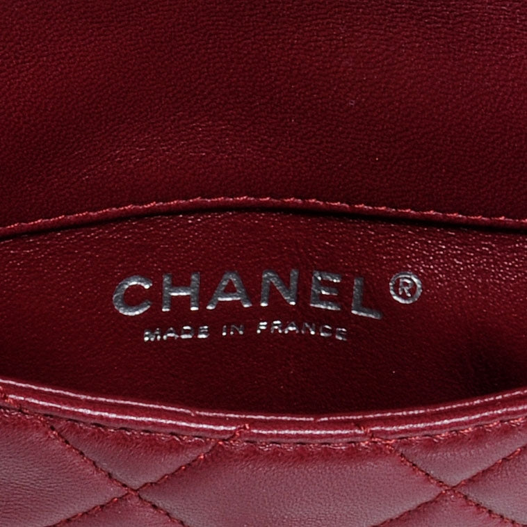 Lambskin Mineral Nights Flap Wristlet Dark Red