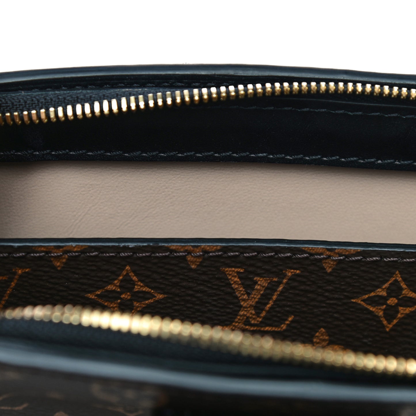 Reverse Monogram Trunk Clutch