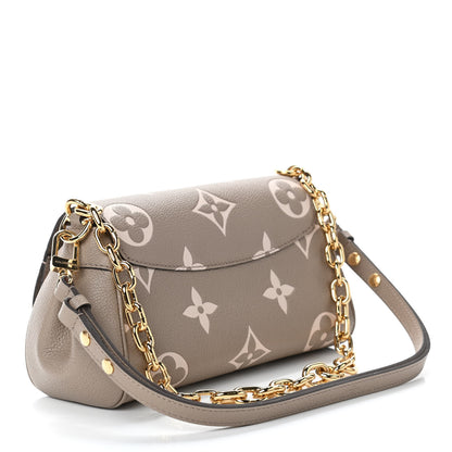 Louis Vuitton Empreinte Monogram Giant Favorite Tourterelle Creme 2 of 4