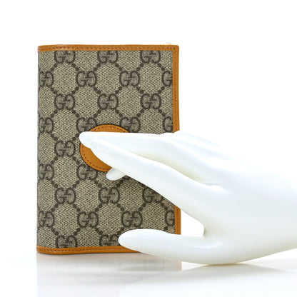 Gucci GG Supreme Monogram Textured Calfskin Retro Interlocking G Passport Case Beige Yellow 2 of 6