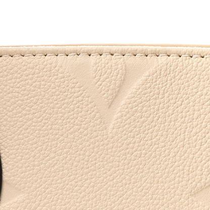 Louis Vuitton Empreinte Monogram Giant Onthego PM Cream Beige 7 of 10