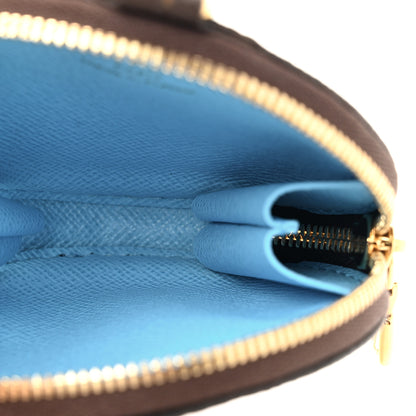 Louis Vuitton Monogram 2022 Christmas Animation Tokyo Round Coin Purse Blue 5 of 7