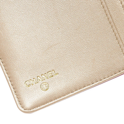 Chanel Lambskin Camellia Embossed Yen Wallet Fuchsia 6 of 8
