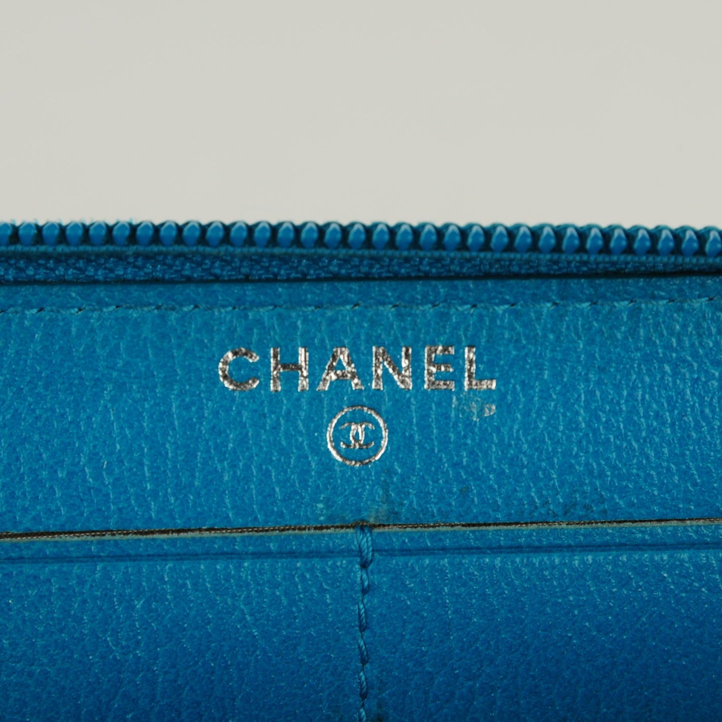 Goatskin Embossed Jacket Zip Around Wallet Blue