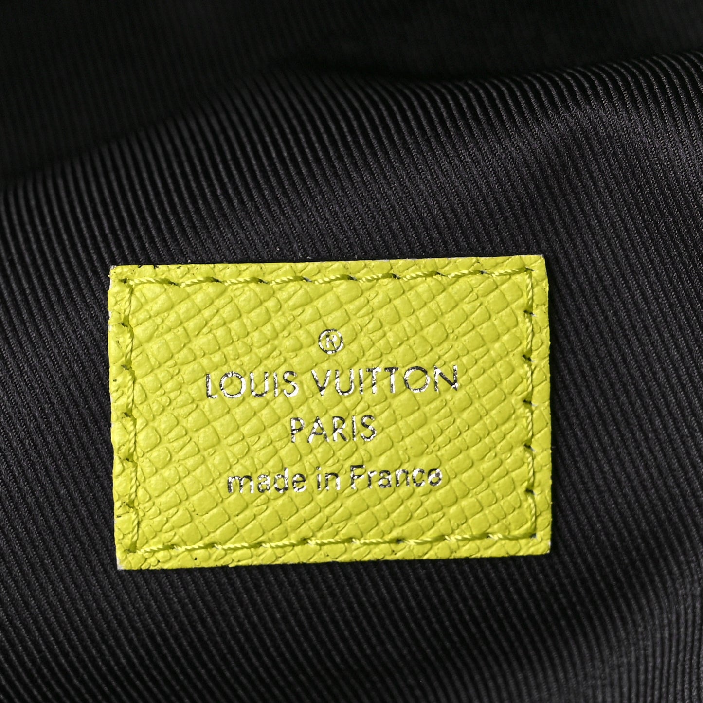 Taiga Monogram Discovery Backpack PM Yellow