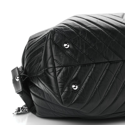 Chanel Aged Calfskin Chevron Quilted Duffle Bag Black 7 of 9