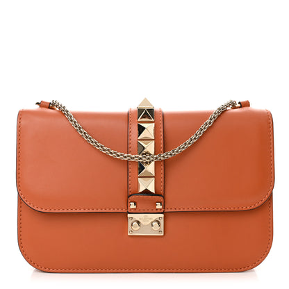 Valentino Garavani Vitello Medium Glam Lock Rockstud Flap Orange 1 of 11