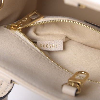 Louis Vuitton Empreinte Monogram Giant Onthego PM Creme Bois De Rose 9 of 10