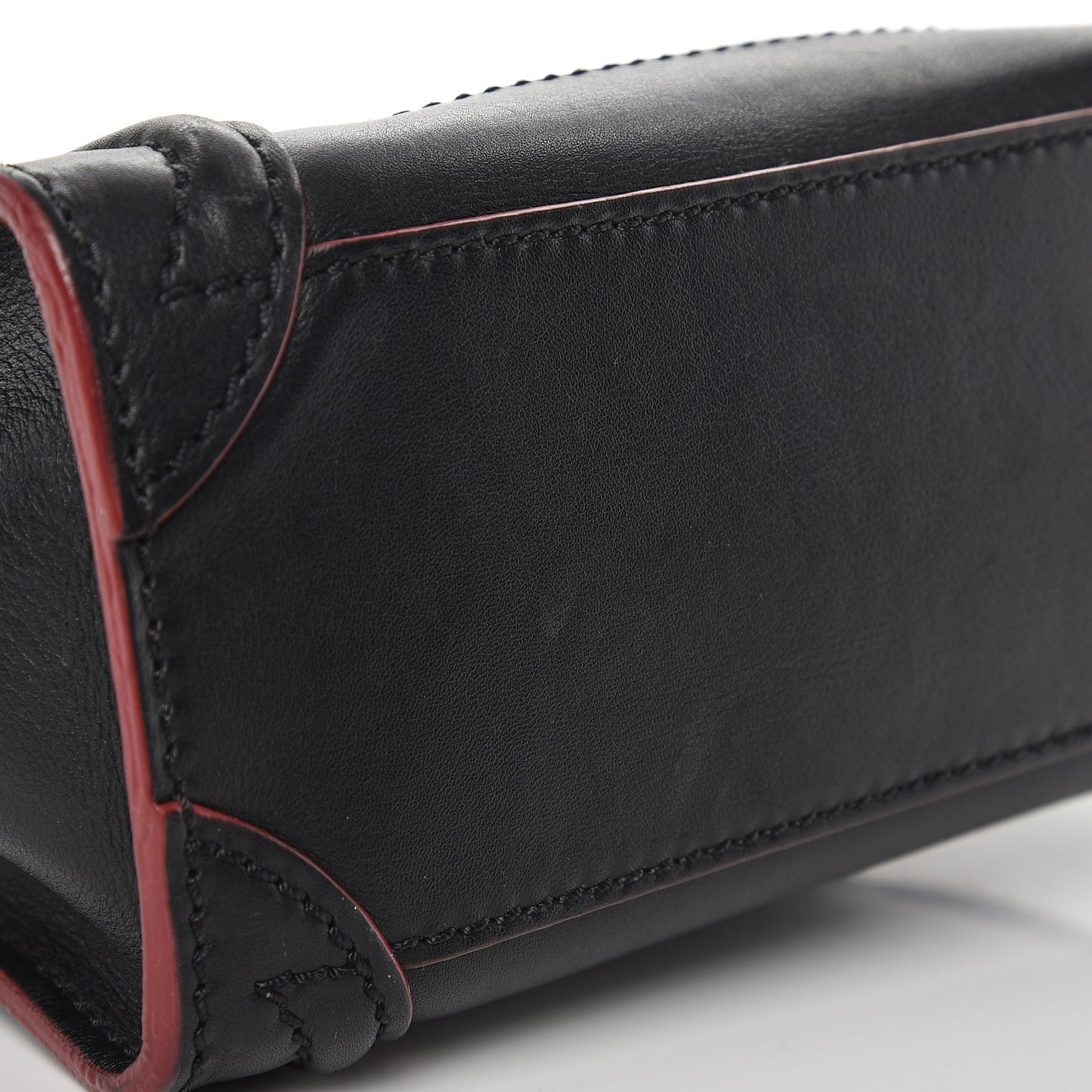 Smooth Calfskin Nano Luggage Black Red