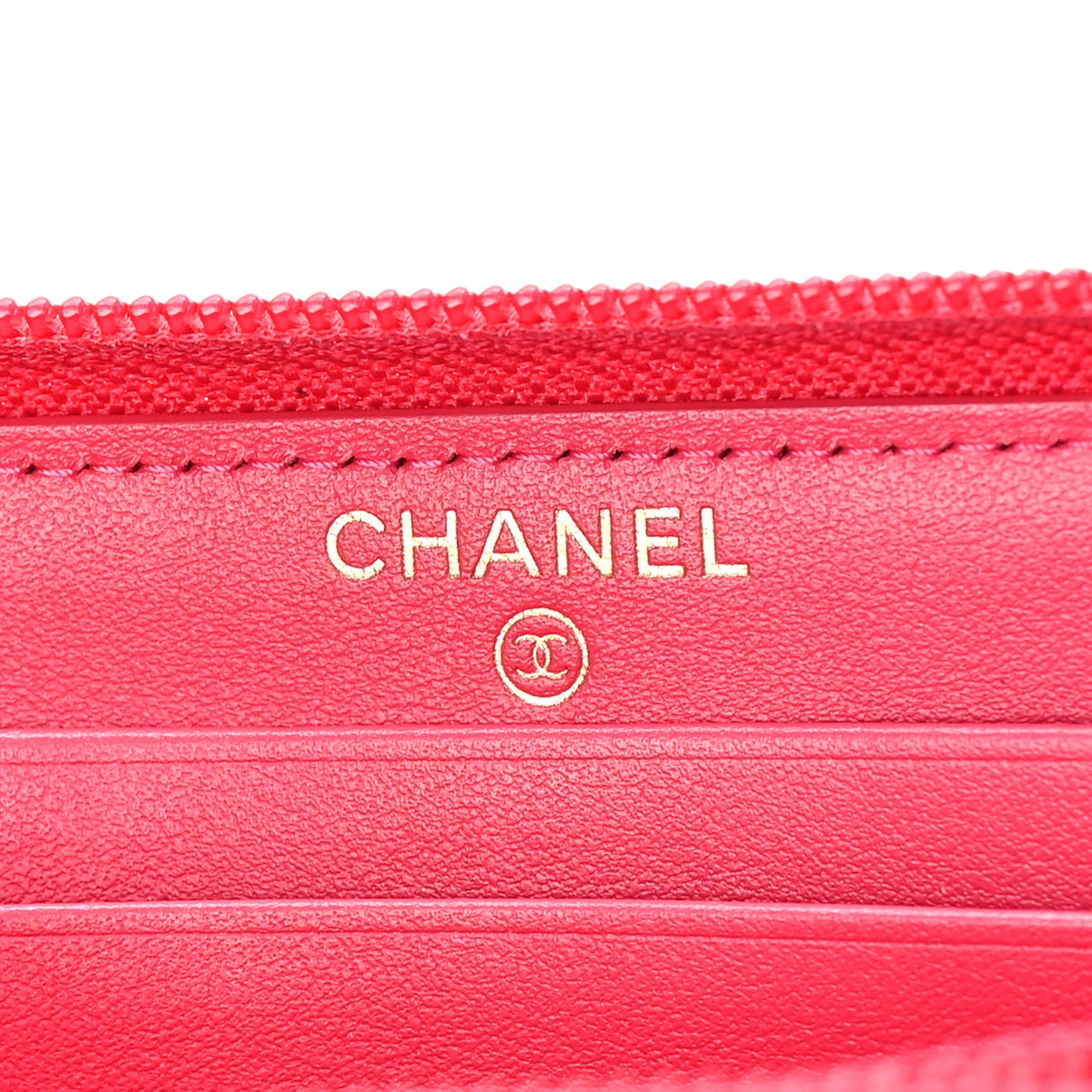 Caviar Quilted Small Boy Zip Around Wallet Fuchsia