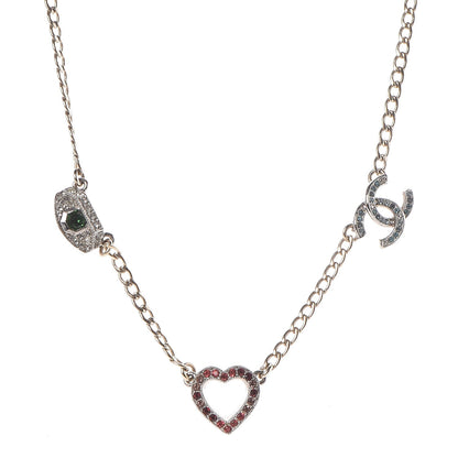 Chanel Crystal Eye Heart CC Charm Necklace Gold Silver 1 of 6