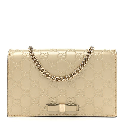 Gucci Metallic Guccissima Signature Bowy Chain Wallet Golden Beige 1 of 14