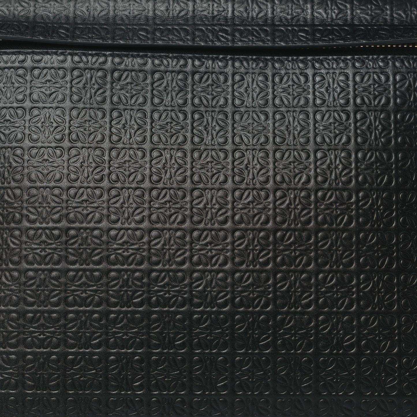 Calfskin Embossed Repeat T Pouch Black