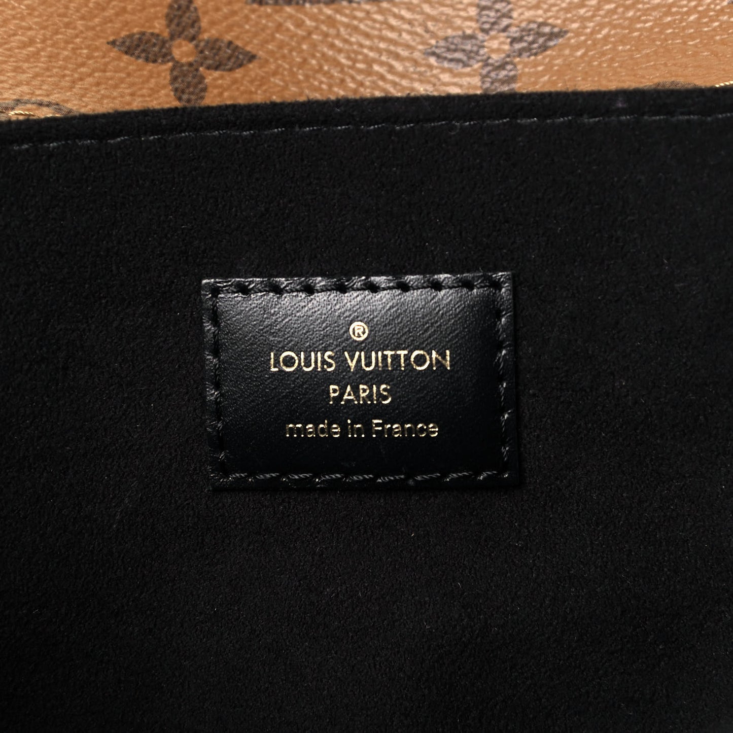 Reverse Monogram Pochette Metis