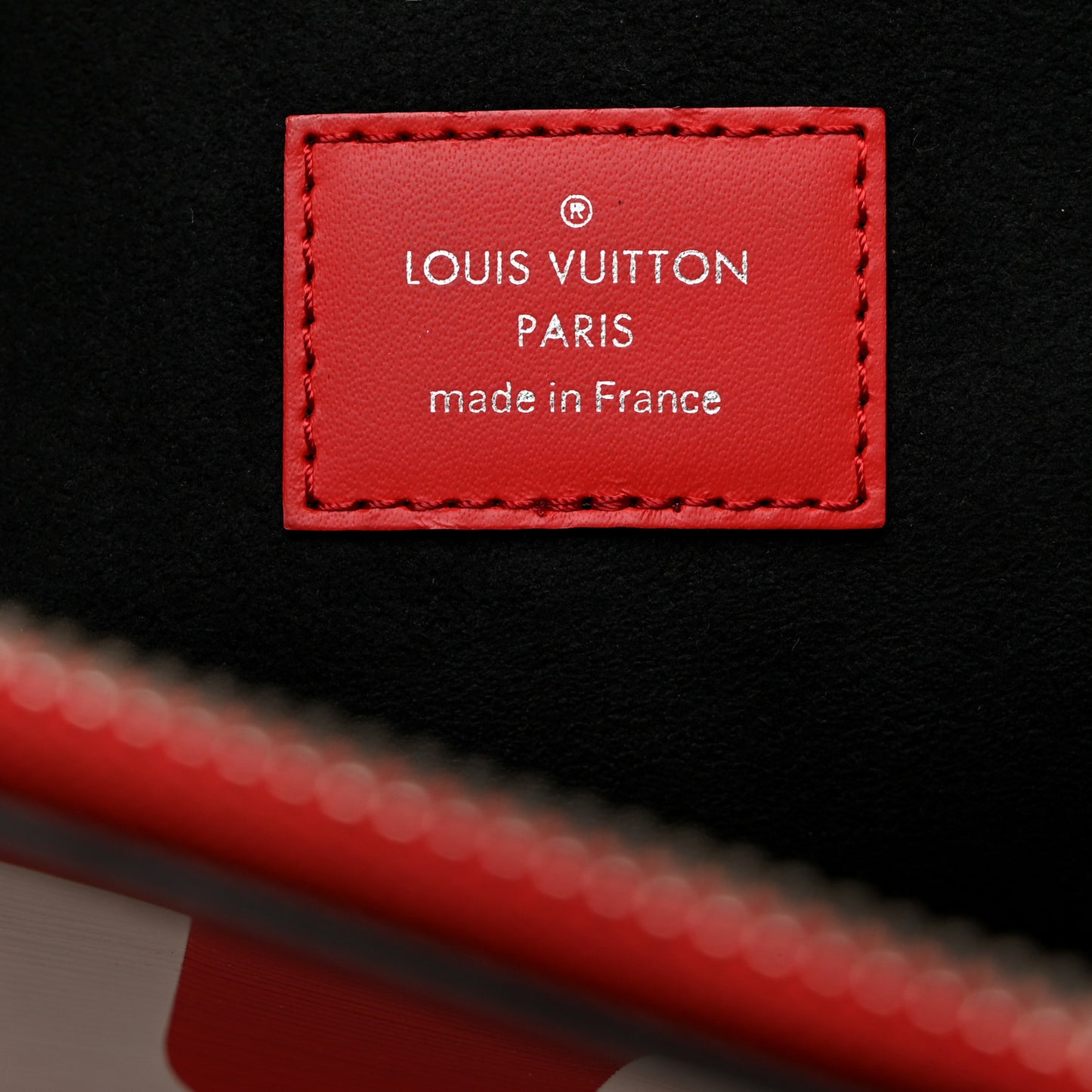 X SUPREME Epi Pochette Jour GM Red