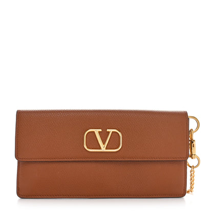 Valentino Garavani Grainy Calfskin Vlogo Wristlet Clutch Tan 1 of 7