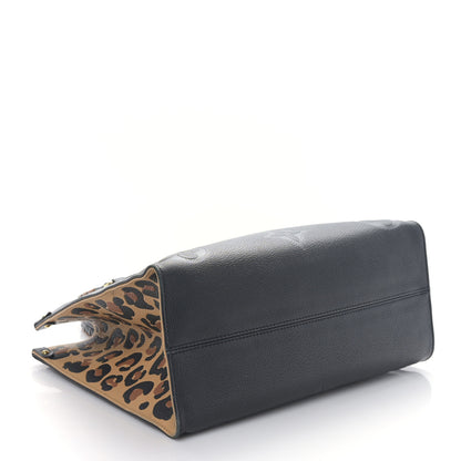 Louis Vuitton Empreinte Monogram Giant Wild At Heart Onthego MM Black 4 of 8