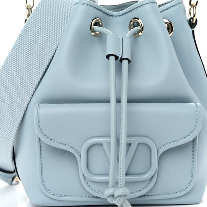 Valentino Garavani Calfskin Vlogo Small Loco Drawstring Bucket Bag Light Blue 7 of 9