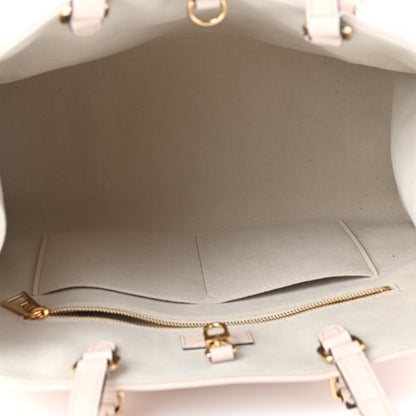 Louis Vuitton Empreinte Monogram Giant By The Pool Onthego MM Cream Saffron 4 of 5