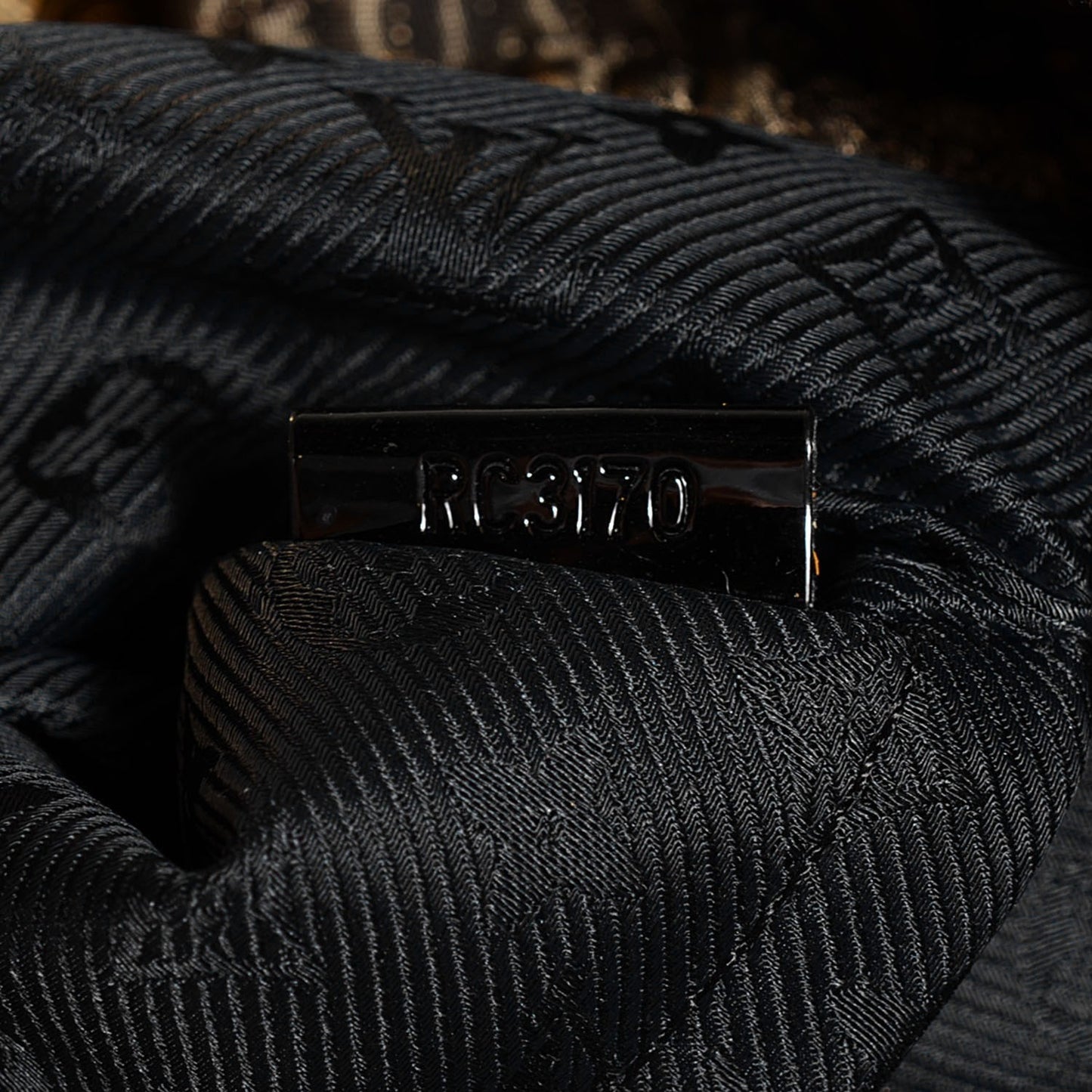 Jacquard Quilted Monogram Altair Clutch Bronze