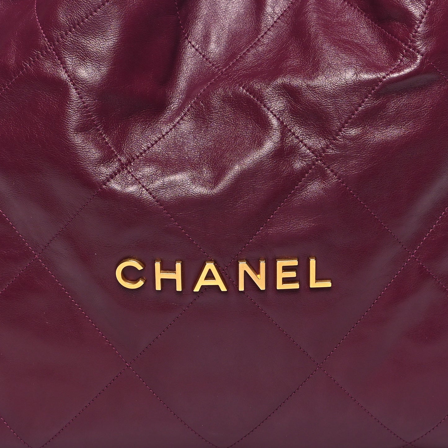 Shiny Calfskin Quilted Chanel 22 Drawstring Bag Dark Purple