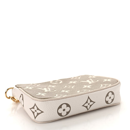 Louis Vuitton Empreinte Spring in the City Mini Pochette Accessories Kaki Beige Cream 4 of 9