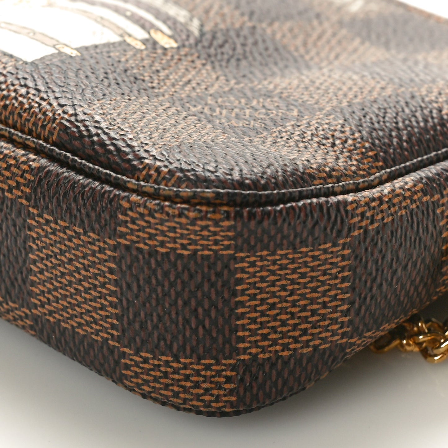 Damier Ebene Trunks and Locks Mini Pochette Accessories